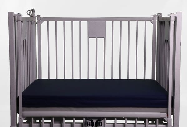 C-Matt Crib Mattress in a crib frame