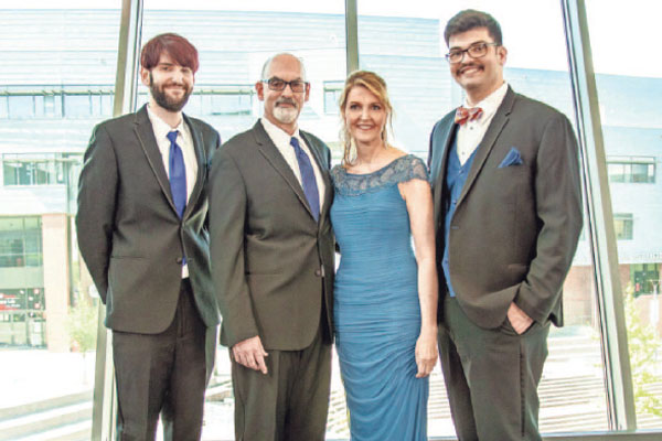 Thomas Mangold-Lenett, Michael Lenett, Melissa Mangold, and Samuel Mangold-Lenett